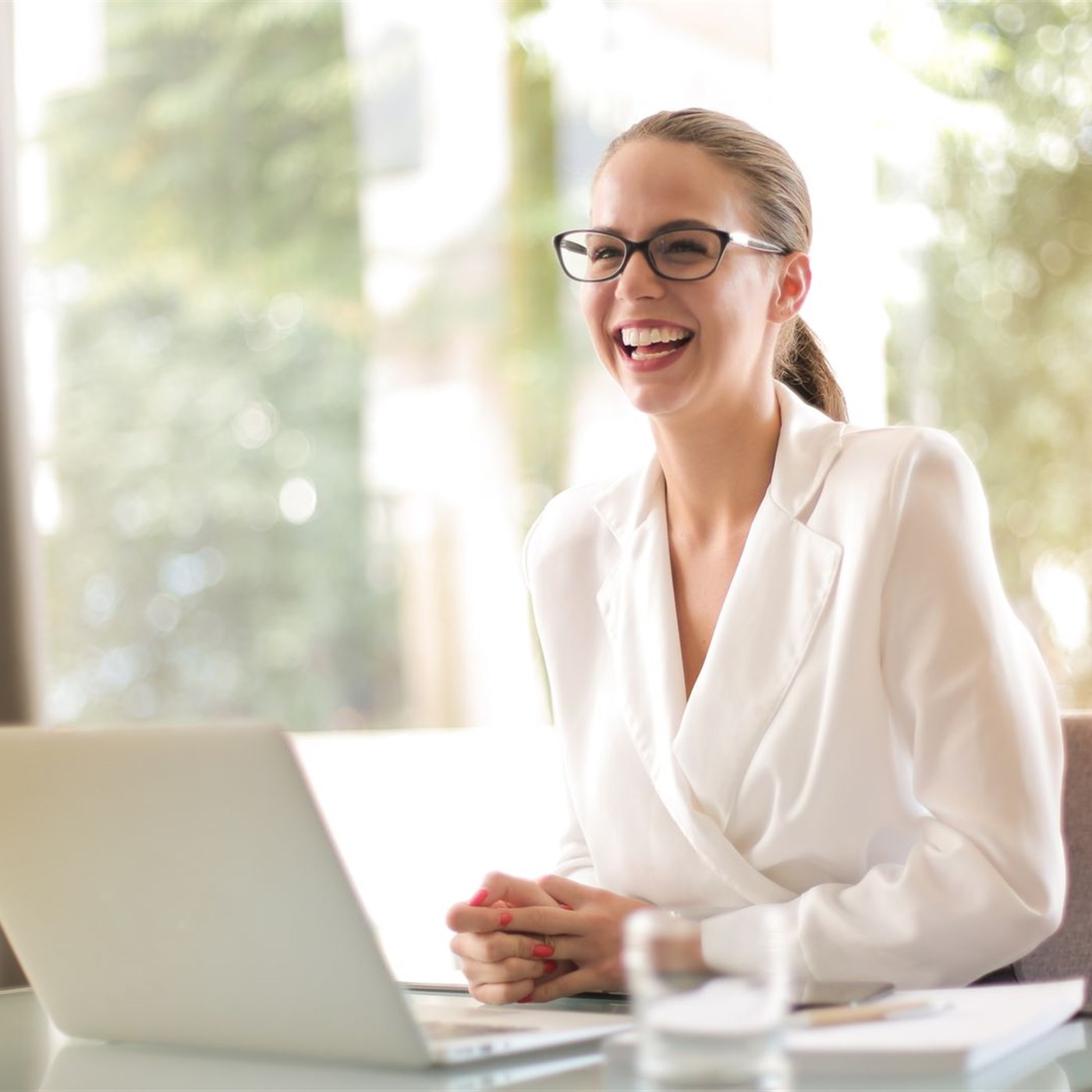 NOVA mentor working with laptop in office